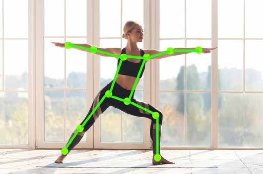 A person mid pose with a skeleton overlay tracking their joints.