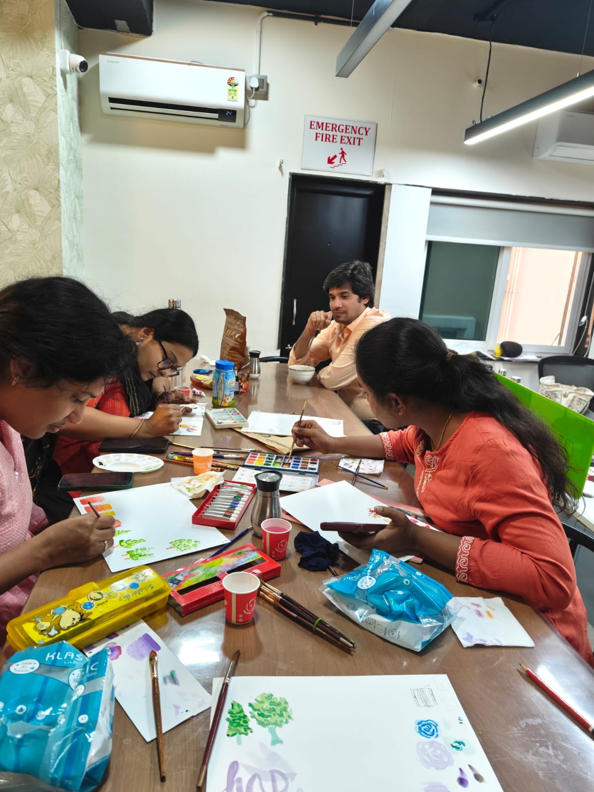 A painting session set up in the office.